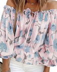 Schulterfreie Bluse mit Blütenmuster für Eleganz 0