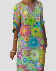 Blumenkleid mit V-Ausschnitt und floralem Design – Elegante Damenmode für jeden Anlass 1