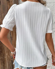 Elegante Damenbluse mit Puffärmeln für Festlichkeiten 1