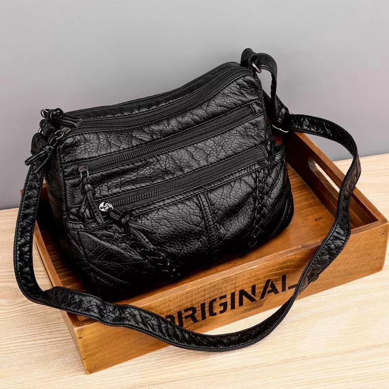 Elegante Handtasche aus weichem Leder 7