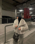 Eleganter Wintermantel mit luxuriöser Wärme 1