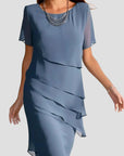 Figurbetontes Sommerkleid aus fließendem Stoff für elegante Anlässe 1