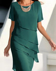 Figurbetontes Sommerkleid aus fließendem Stoff für elegante Anlässe 3