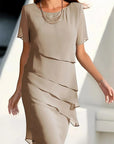 Figurbetontes Sommerkleid aus fließendem Stoff für elegante Anlässe 4