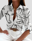 Künstlerische Bluse mit knöpfbarem Design 0
